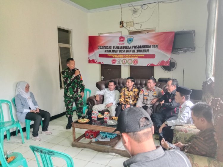Lettu Inf Ibna Suhar – Danramil 0106/Menes melaksanakan Sosialisasi Pembentukan Posbankum dan Mahkamah Desa/Kelurahan di Kecamatan Menes