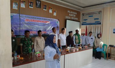 Sertu Rahmat Babinsa Koramil 0103/Banjar Hadiri Musrenbang dan Sertijab PJ Kepala Desa Mogana TA 2026