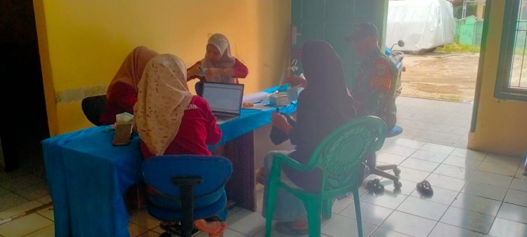 Babinsa Koramil 0102/Cadasari Laksanakan Komsos Bersama Perangkat Desa Bahas Pemutakhiran Data Wajib Pajak