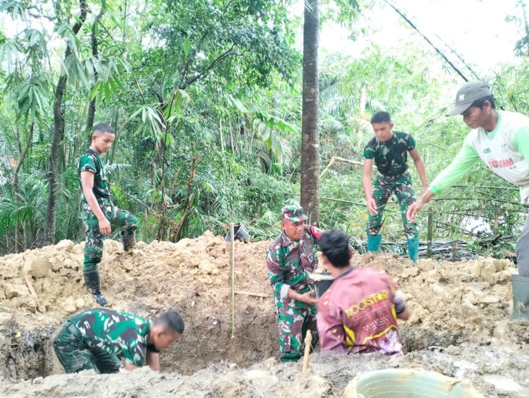 TNI Bersama Warga Gotong Royong Bangun Jembatan Gantung Sungai Cikayang Hari Ke-7