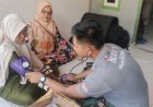 Personel Kesehatan Satgas TMMD Berikan Pelayanan Kesehatan Gratis, Warga Desa Pasirgadung Antusias Periksa Kesehatan