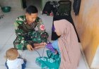 Personel Kesehatan Satgas TMMD Ke-129 Sigap Layani Warga yang Mengeluh Pusing di Desa Pasirgadung