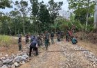 SATGAS TMMD KE-129 KODIM 0601/PANDEGLANG HARI KE-18 TERUS GENJOT PEMBUKAAN DAN PENGERASAN JALAN DI DESA PASIRGADUNG