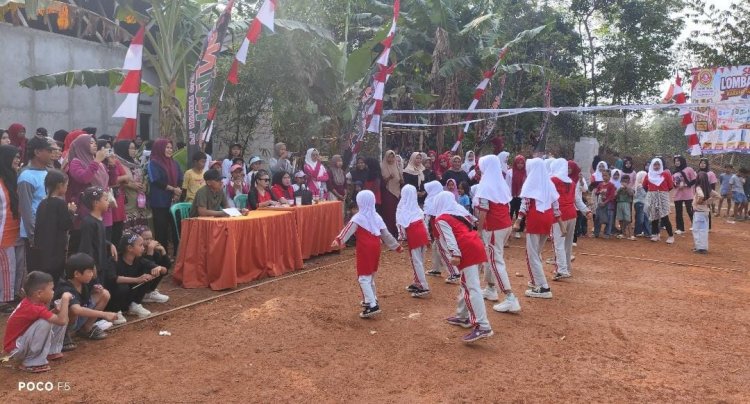 Anggota Satgas TMMD ke-129 Kodim 0601/Pandeglang Turut Jadi Juri Lomba di Desa Pasirgadung